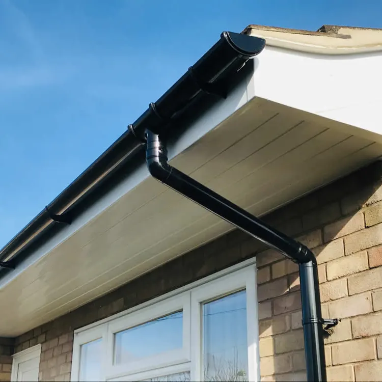 Black gutter and downpipe