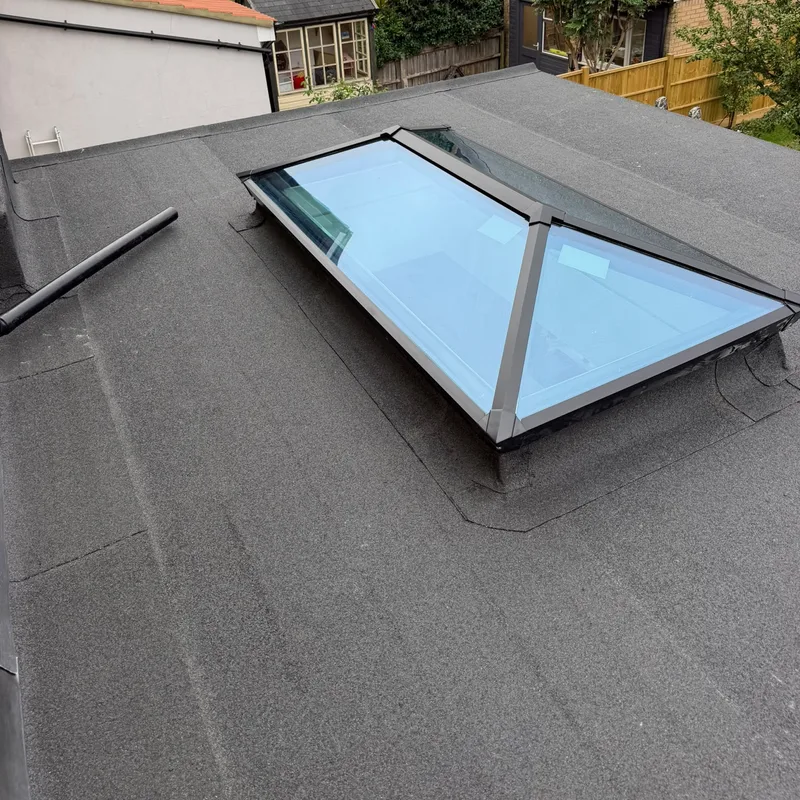 Flat roof with a glass lantern