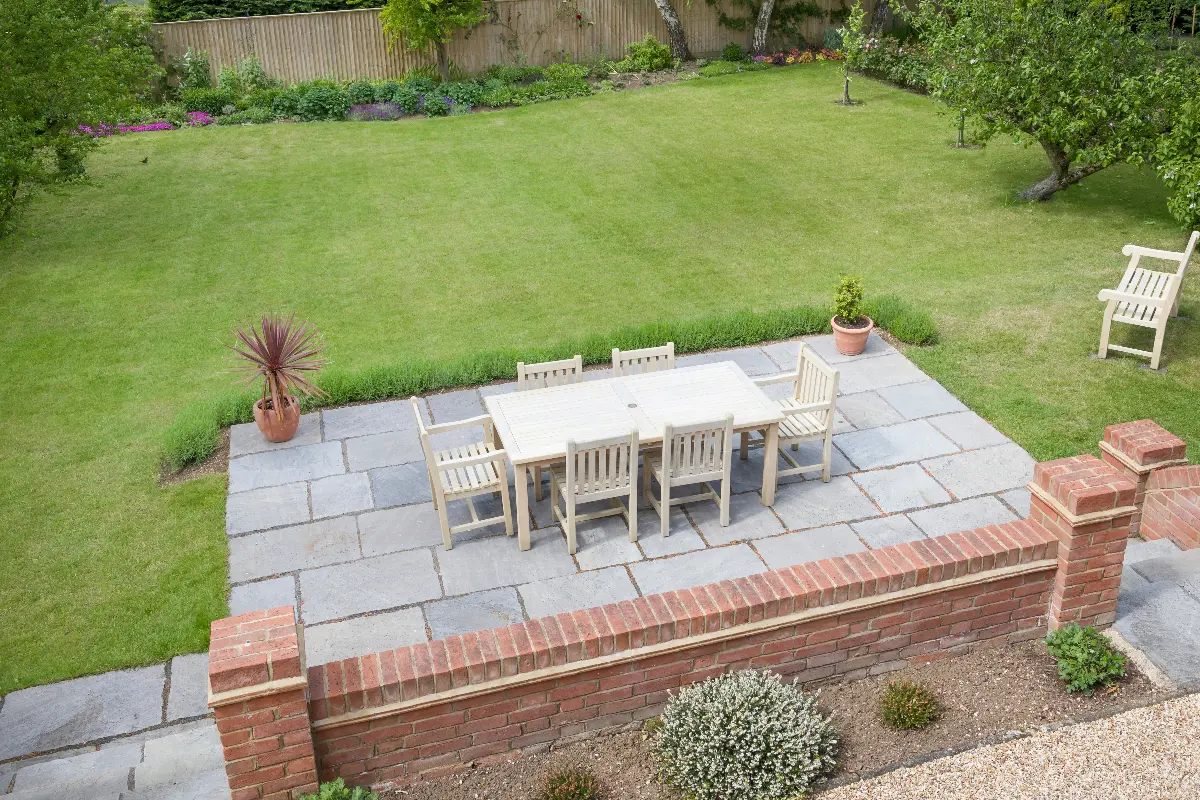 A landscaped rear garden with lawn and paving