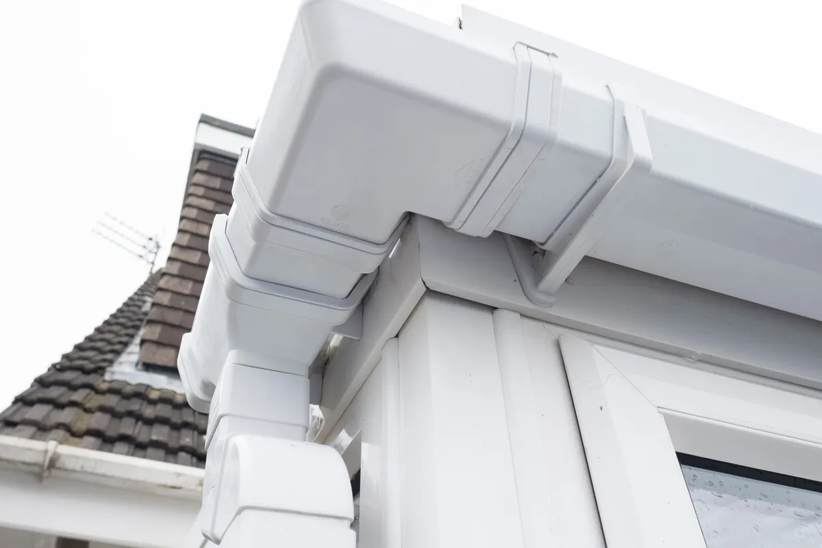 A white fascia, soffit and gutter junction at the eaves
